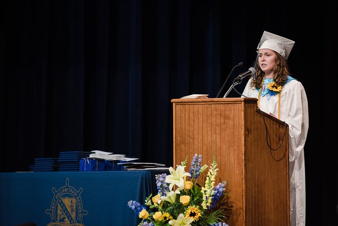 Valedictorian Sarah Montembeau addresses her fellow graduating classmates at the Traip Academy graduation ceremony. Anna Solo/Seacoastonline