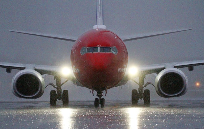 The first Norwegian flight to Rhode Island taxis to the gate at T.F. Green. It was arriving from Edinburgh, Scotland. [The Providence Journal / Glenn Osmundson]