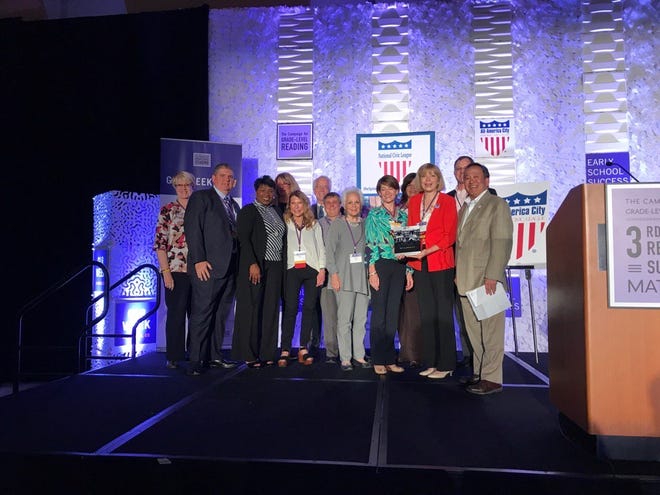 Participants in the Suncoast Campaign for Grade-Level Reading accept the All-America Cities award in Denver, Colorado, on Friday, June 16, 2017. [Herald-Tribune staff photo / Brian Ries]