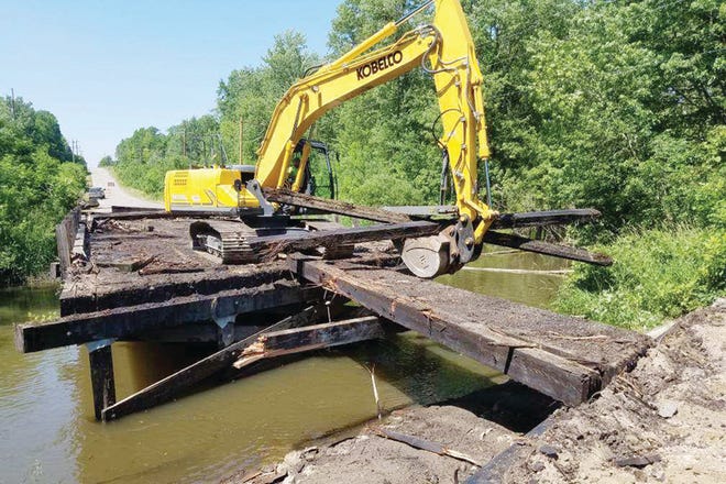 Work has begun on the Wilmoth Highway bridge, which will trade its wood spans for concrete this summer.