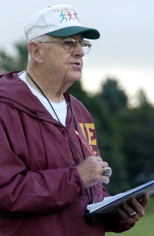 Often holding his ubiquitous clipboard, Ted Miller served as the head coach or an assistant coach for the North East boys and girls cross country and track and field programs for about five decades. Miller died this earlier year after a battle with cancer. The Erie Times-News will present the Lifetime Achievement award to Miller's family at the Best of Varsity Cup dinner. [FILE PHOTO/ERIE TIMES-NEWS]