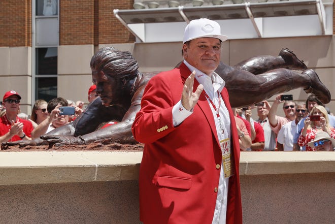 Former Cincinnati Reds player Pete Rose smiles as he stands for pictures during the dedication of his statue outside Great American Ballpark prior to Saturday's game between the Reds and Dodgers.