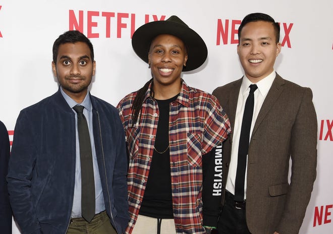 FILE - In this May 18, 2016 file photo, Aziz Ansari, left, the star, writer, director and co-creator of the Netflix series "Master of None," poses with cast members, Lena Waithe, center, and co-creator/executive producer Alan Yang at an Emmy For Your Consideration screening of the show in Beverly Hills, Calif. (Photo by Chris Pizzello/Invision/AP, File)