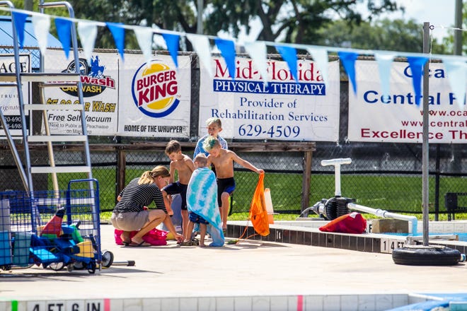 Swimmers finish up their lessons at the Newton Perry Aquatic Center at the College of Central Florida last week. [Alan Youngblood/Staff photographer]