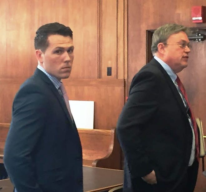 Bryan McElhinney, left, 24, in Suffolk Superior Court Friday, June 16, 2017, next to his attorney Michael Doolin. McElhinney is charged with manslaughter in the death of Quincy man Brian Hingston.