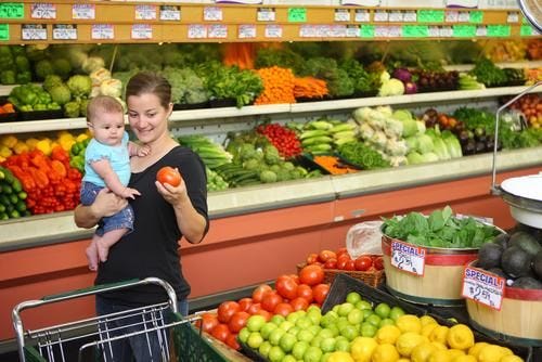 A mother selects produce under the Supplemental Nutrition Assistance Program, or food stamp program. A Fayette County lawmaker has introduced a bill addressing public assistance abuse, noting that $14 million in Pennsylvania-issued benefits was spent in Florida between 2013 and 2015.