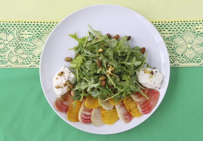 Arugula salad with roasted nuts and burrata [Eric Albrecht/Dispatch]