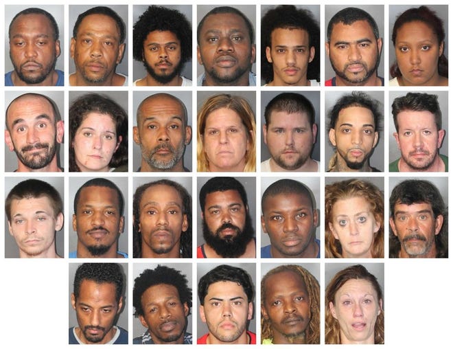 Police say these 27 people were arrested during a large-scale police operation in Brockton, Tuesday, June 20, 2017.