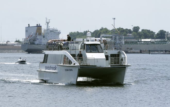 The Providence-Newport ferry approaches it's dock in Providence's India Park last August. [The Providence Journal, file / Kris Craig]