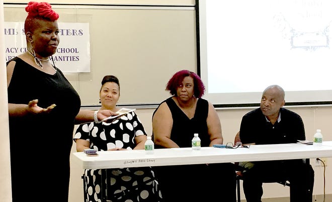 Willingboro resident Helen Cook, the lead founder for the proposed Legacy Charter School for the Arts and Humanities, speaks at a meeting at the Willingboro Public Library on Monday, June 19, 2017, with three members of her founding team (from left): Donielle Finch, of Willingboro; Felecia Burton, of Willingboro; and Allen Jones of Mount Laurel.