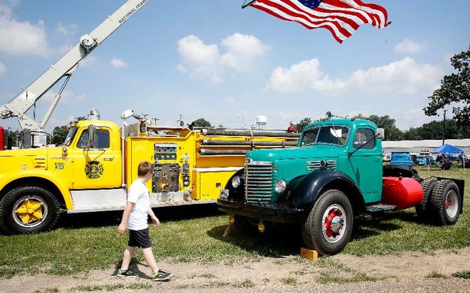 Antique trucks invade the Ashland County Fairgrounds during the Ohio Vintage Truck Jamboree on Saturday. (T-G photo/Noelle Bye)