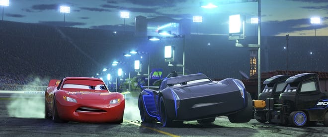 This image released by Disney shows Lightning McQueen, voiced by Owen Wilson, (left) and Armie Hammer, voiced by Jackson Storm, in a scene from 'Cars 3.' [The Associated Press]