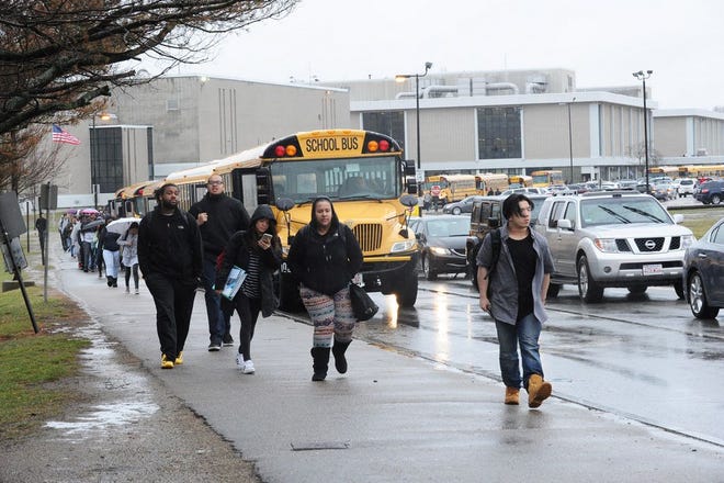 Students leaving Brockton High School on April 6, 2017. Their dress code will be more accommodating to current trends next year.