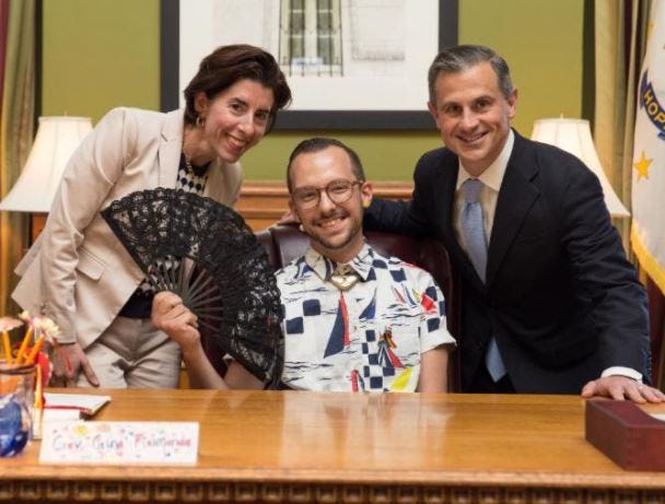 Nikos Giannopoulos, Rhode Island's teacher of the year, spoofs his recent photo with President Donald Trump and First Lady Melania Trump at the White House with Gov. Gina Raimondo and First Gentleman Andy Moffit at the State House.