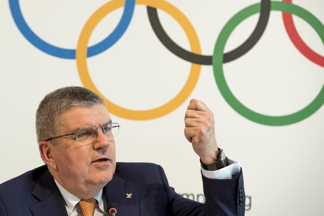 International Olympic Committee President Thomas Bach, from Germany, speaks during a press conference after an executive board meeting at the Olympic Museum in Lausanne, Switzerland, June 9. [Jean-Christophe Bott/Keystone via AP]