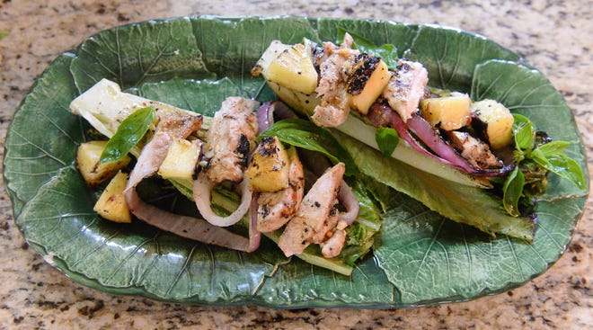 Lucindy Willis' Grilled Romaine with Chicken and Pineapple is a great way to grill up a healthy and filling dish for family and friends. 

[Caroline Brehman/Times-News]