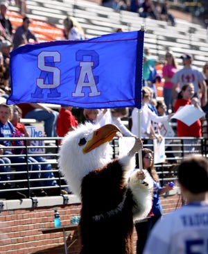 11-13-2010 -- Troy, Ala. -- Sumter Academy's mascot waves the school flag during the AISA Class A Championship Game against Coosa Valley Academy at Troy University's Veterans Memorial Stadium Friday, Nov. 19, 2010. (Marion R Walding | The Tuscaloosa News)
