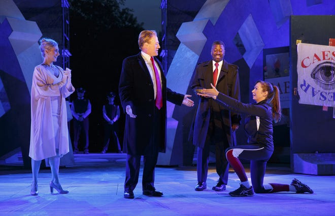 In this May 21 file photo provided by the Public Theater, Tina Benko, left, portrays Melania Trump in the role of Caesar's wife, Calpurnia, and Gregg Henry, center left, portrays President Donald Trump in the role of Julius Caesar during a dress rehearsal of the Public Theater's Free Shakespeare in the Park production of "Julius Caesar" in New York. Other cast members include Teagle F. Bougere, center right, and Elizabeth Marvel. [THE ASSOCIATED PRESS]