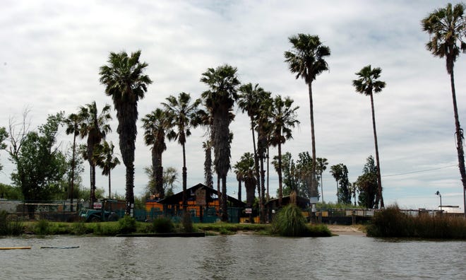 Lost Isle, the Delta’s storied 21-and-over party resort, will reopen in April 2018 with a bigger restaurant, Tiki bar, outside barbecue, bandstand and dance floor, and a special Lost Isle beer label. [CALIXTRO ROMIAS/RECORD FILE 2012]