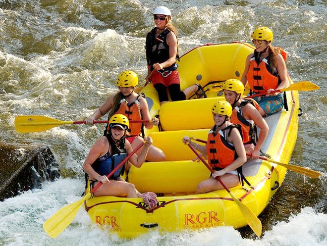 CHIEFTAIN PHOTO/FILE A team of female rafters are all smiles during their race at the Royal Gorge Whitewater Festival in Canon City.
