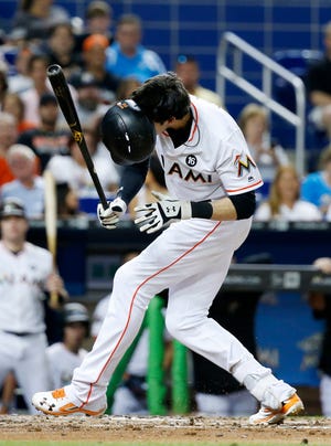 Miami Marlins' Christian Yelich pulls back to avoid a close pitch during the third inning of a baseball game against the Chicago Cubs, Friday, June 23, 2017, in Miami. (AP Photo/Wilfredo Lee)