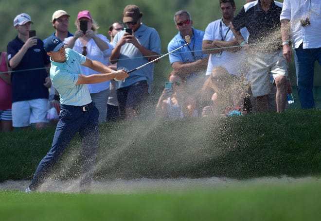 Jordan Spieth hits his second shot on the ninth hole during the third round of the Travelers Championship golf tournament at TPC River Highlands on Saturday, June 24, 2017, in Cromwell, Conn. (Brad Horrigan/Hartford Courant via AP)