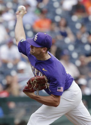 LSU starting pitcher Alex Lange allowed just two hits in 7 1/3 innings as the Tigers defeated Oregon State 3-1 in a College World Series elimination game Friday. [Nati Harnik/The Associated Press]