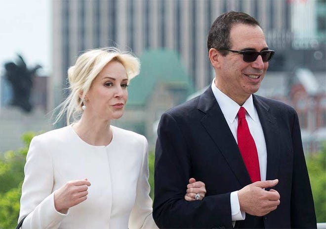 It's the third marriage for Treasury Secretary Steven Mnuchin, right, and the second for actress Louise Linton.