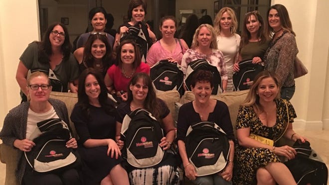 Preparing for the Palm Beach Synagogue’s Jewish Women’s Renaissance Project trip are top row, from left, Jodi Stahl, Grace Shalom, Elizabeth Thal, Lisa Fogelson, Lisa Weisberg, rebbetzin Dinie Scheiner, Orly Popik and Jami Leventhal; middle row, from left, Patricia Gottenger and Sarah Walsh; and seated, from left, Gina Blatt, Sarah Dworcan, Heather Lazerus, Susan Skanter and Osnat Mendelson. Photo by Dr. Emanuel Gottenger