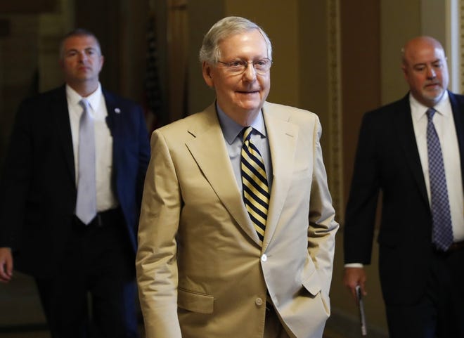 Senate Majority Leader Mitch McConnell of Ky. walks from his office on Capitol Hill in Washington, Monday, June 26, 2017. Senate Republicans unveil a revised health care bill in hopes of securing support from wavering GOP lawmakers, including one who calls the drive to whip his party's bill through the Senate this week "a little offensive." (AP Photo/Carolyn Kaster)
