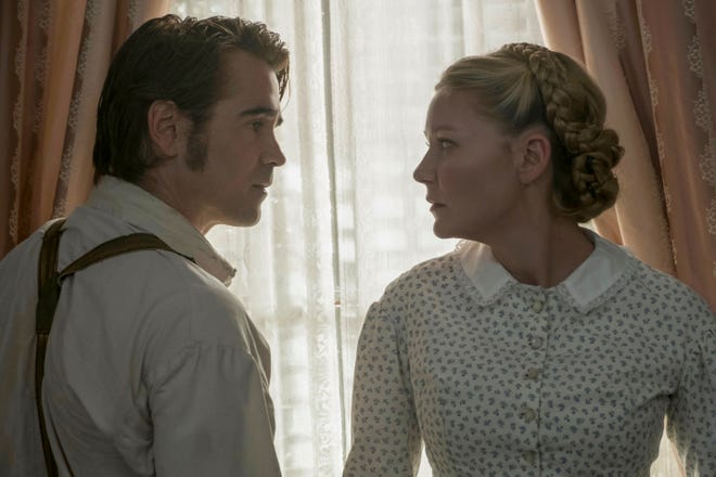 John McBurney (Colin Farrell) attempts to share his thoughts with Edwina (Kirsten Dunst). [Focus Features]