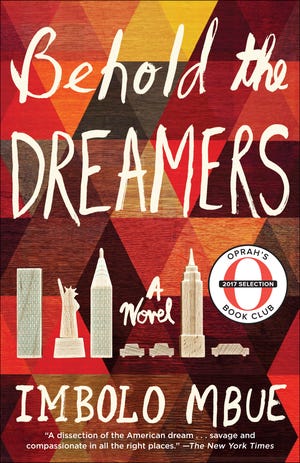 This cover image released by Random House shows "Behold the Dreamers," a novel by Imbolo Mbue and Oprah Winfrey’s latest selection for Oprah's Book Club. (Random House via AP)
