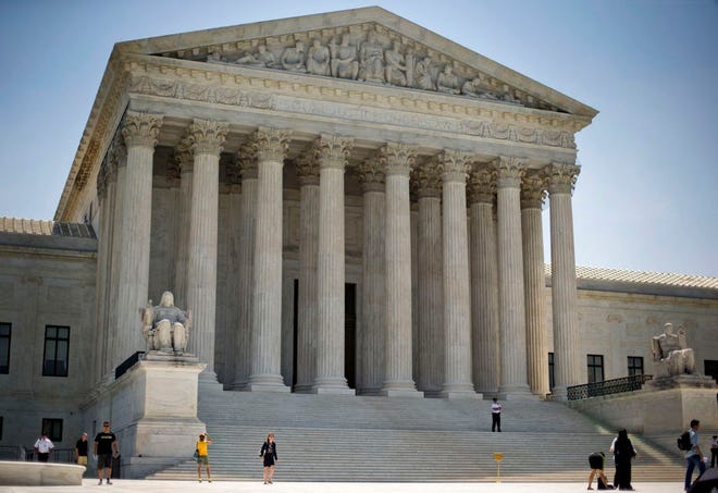 In this June 30, 2014 file photo, the Supreme Court building in Washington. (AP Photo/Pablo Martinez Monsivais, File)
