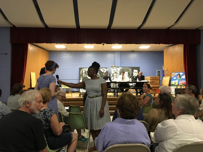 Residents question candidates vying for the Ward 3 City Council seat in Providence on Tuesday night. [The Providence Journal / Jennifer Bogdan]
