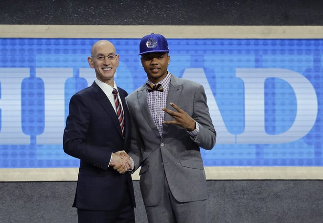 Markelle Fultz poses for a photo with NBA Commissioner Adam Silver after being selected by the Sixers as the No. 1 pick overall during the NBA draft Thursday, June 22, 2017, in New York.