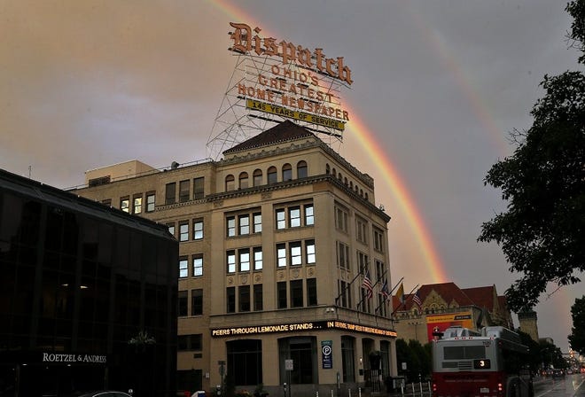 Capitol Square Ltd., the owner of the Downtown building that housed The Columbus Dispatch until 2016, wants to convert it into offices and have restaurant space on the first floor. On Monday, a rainbow framed the buildilng. [Brooke LaValley/Dispatch]