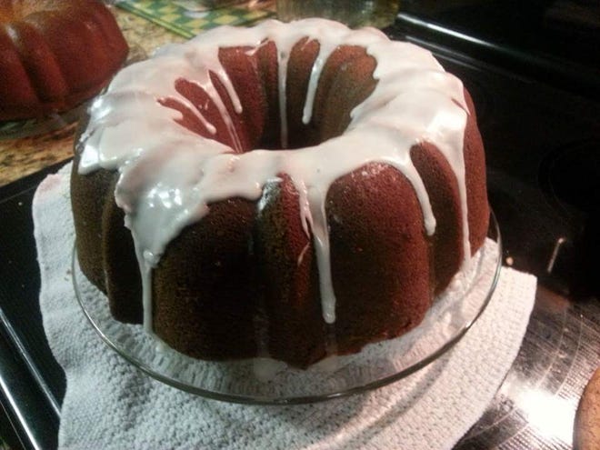 Aunt Cecilia's 7UP pound cake topped with a sweet, drizzled glaze. [ZE CARTER / CORRESPONDENT]
