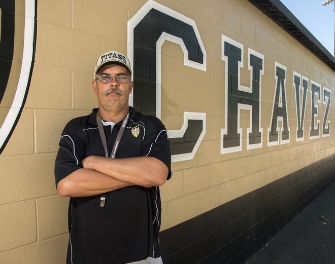 Michael Chicago Sr. has been hired as Chavez High's new head football coach. Chicago, who specializes in defense, was an assistant for former Titans head coaches John Ward and La Te'f Grim. [CLIFFORD OTO/THE RECORD]