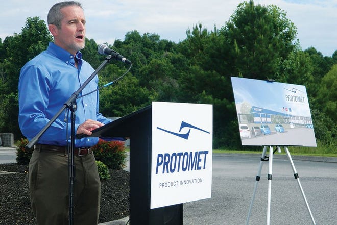 Jeff Bohanan, Protomet founder and CEO, announces during a press conference Tuesday that the manufacturing plant will stay in Oak Ridge. The company will expand into a plant in Loudon County, however.