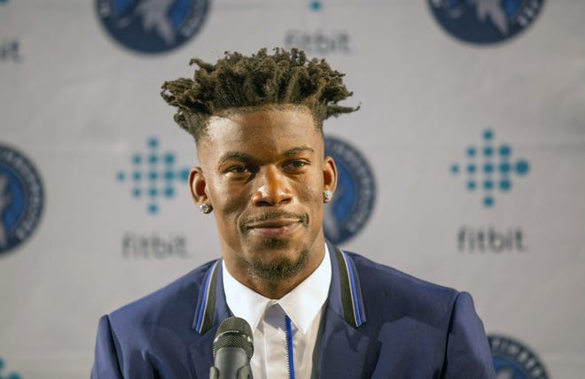 Minnesota Timberwolves guard Jimmy Butler smiles during a news conference at Mall of America in Bloomington, Minn., on Thursday, June 29, 2017. The Chicago Bulls traded Butler to the Timberwolves earlier this month. [ANDY CLAYTON-KING/THE ASSOCIATED PRESS]