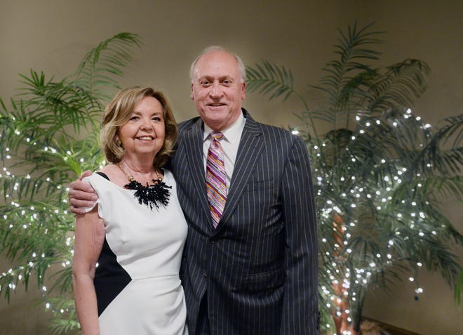 Superior Court Administrator Barbara Dodson and Superior Court Judge Wayne Abernathy, right, were honored during a retirement party on Thursday. [Steven Mantilla/Times-News]