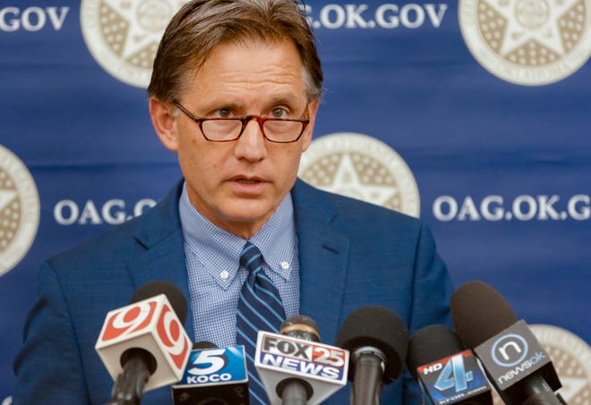 Attorney General Mike Hunter speaks during a press conference to announce the filing of a lawsuit against five opioid manufacturers for driving the opioid epidemic at the Oklahoma Attorney General's office in Oklahoma City, Okla. on Friday, June 30, 2017. Photo by Chris Landsberger, The Oklahoman
