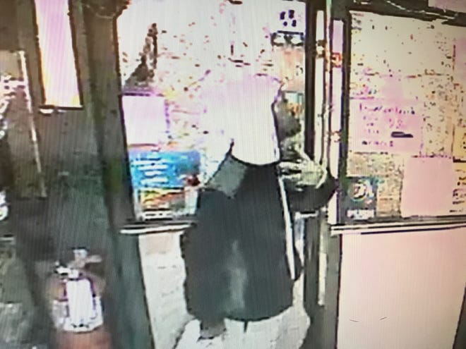 Belleview police provided this surveillance image from an armed robbery at the 7 Days gas station Thursday evening. [BPD]