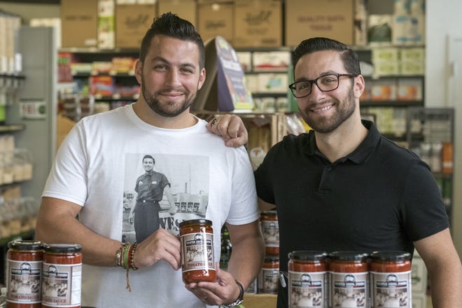 Twins Bill, left, and John Vesper with their signature pasta sauce, based on their grandmother's Italian "gravy," in Swarthmore, Pa. [Ed Hille / Philadelphia Inquirer / TNS]