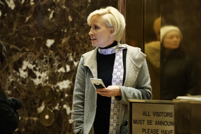 In this Nov. 29, 2016 file photo Mika Brzezinski waits for an elevator in the lobby at Trump Tower, Tuesday, Nov. 29, 2016, in New York. President Donald Trump has used a series of tweets to go after Mika Brzezinski and Joe Scarborough, who've criticized Trump on their MSNBC show "Morning Joe." [AP Photo/Evan Vucci]