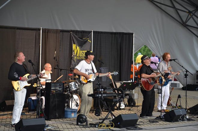 The musicians in Mr. Mustard, who let their music pay tribute to The Beatles, will perform at 6:30 p.m. July 5 on the Yates County Courthouse Lawn.