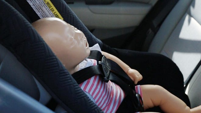 A test dummy was used to demonstrate ways to save an infant or pet in case of emergency during a news conference at Florida Highway Patrol headquarters in Doral.