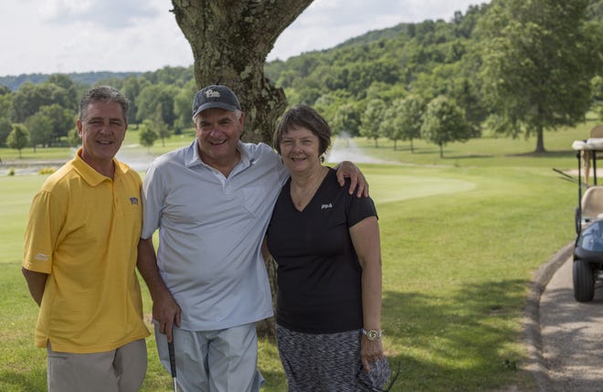 From left, George Mistovich of Center, Rick Gradisek of Center, and Cindy Kuton of Coraopolis, take a break between holes during "The Longest Day of Golf" charity golf marathon Thursday at The Club at Shadow Lakes in Aliquippa. Gradisek golfed all day to raise money for the Amercian Cancer Society, while Mistovich and Kuton followed him along the course and kept score.