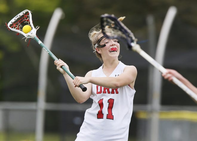 Madison Cooney lines up a shot for Old Rochester lacrosse. She led the team with 86 goals, finishing second in the area and earning her Standard-Times 2017 Girls Lacrosse Player of the Year honors. [MIKE VALERI/THE STANDARD-TIMES/SCMG]