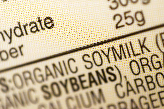 FILE - This Thursday, Feb. 16, 2017, file photo shows the ingredients label for soy milk at a grocery store in New York. The dairy industry says terms like “soy milk” violate the federal standard for milk, but even government agencies have internally clashed over the proper term. (AP Photo/Patrick Sison, File)